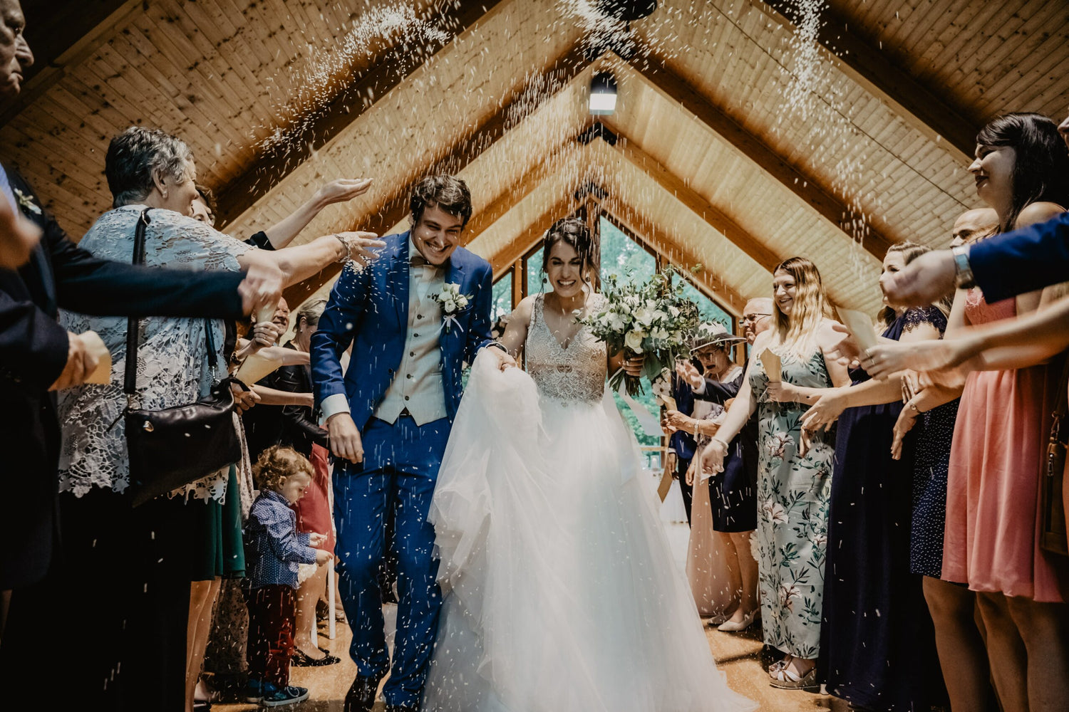 Wide and Groom with Wedding Guests